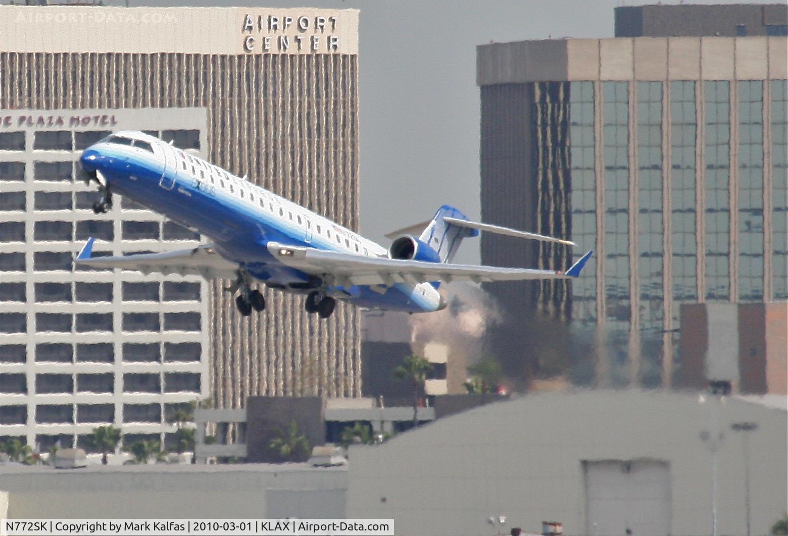 N772SK, 2005 Bombardier CRJ-702 (CL-600-2C10) Regional Jet C/N 10235, SkyWest Bombardier CL-600-2C10,  N772SK, SKW6118 departing 25R KLAX for KASE.