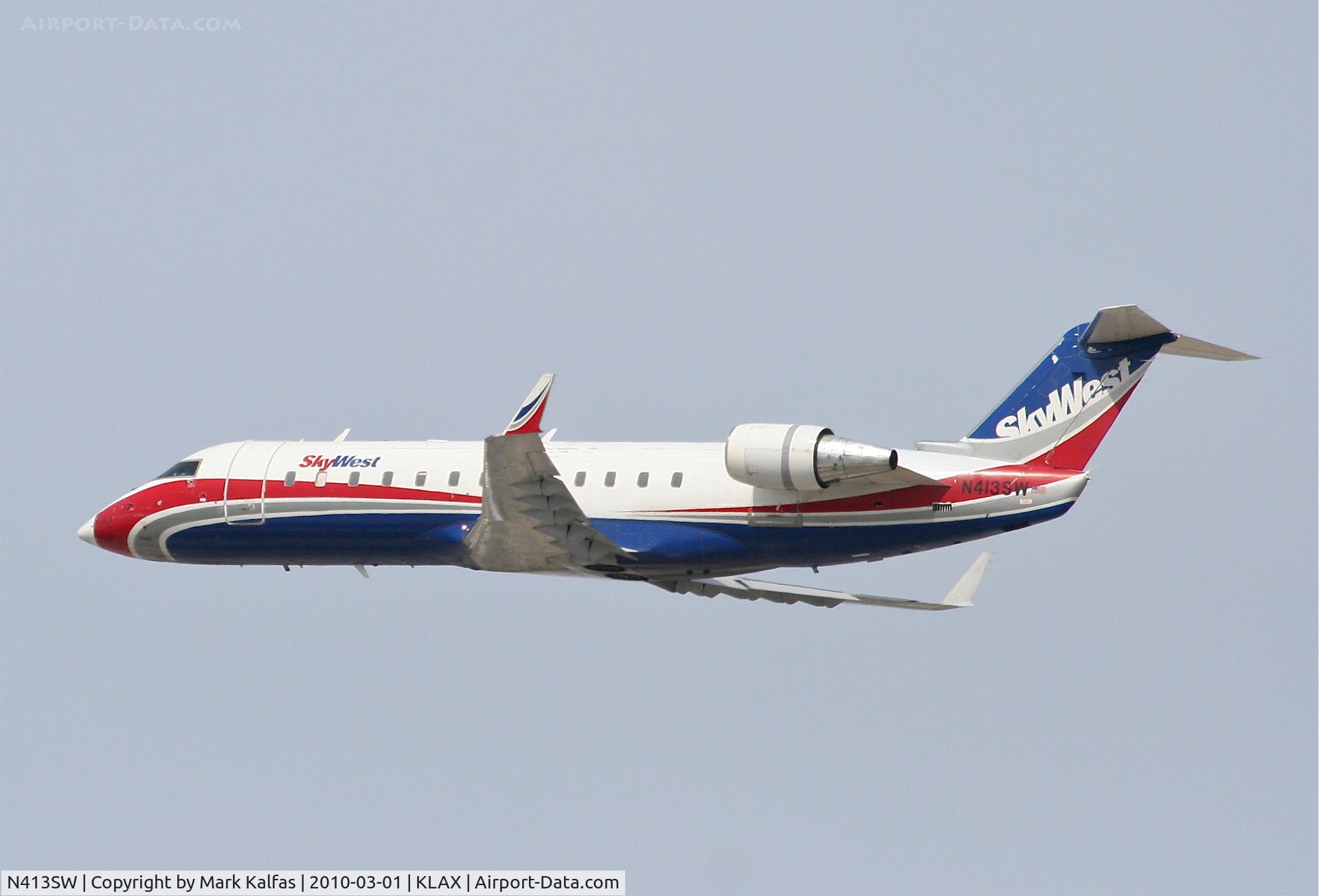 N413SW, 1996 Canadair CL-600-2B19 Regional Jet CRJ-100LR C/N 7102, SkyWest Bombardier CL-600-2C10,  N772SK, SKW4749 departing 25R KLAX for KSAN.