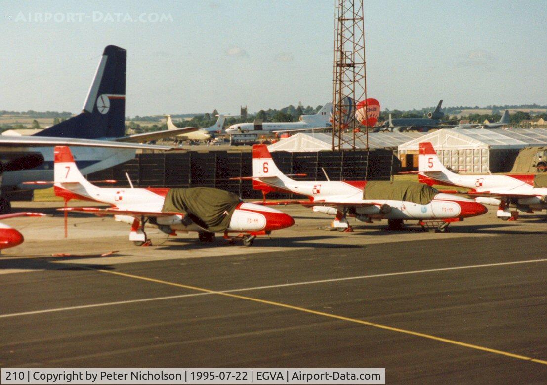 210, PZL-Mielec TS-11 Iskra bis B C/N 1H-0210, TS-11 Iskra of the Polish Air Force display team White Iskras on the flight-line at the 1995 Intnl Air Tattoo at RAF Fairford.