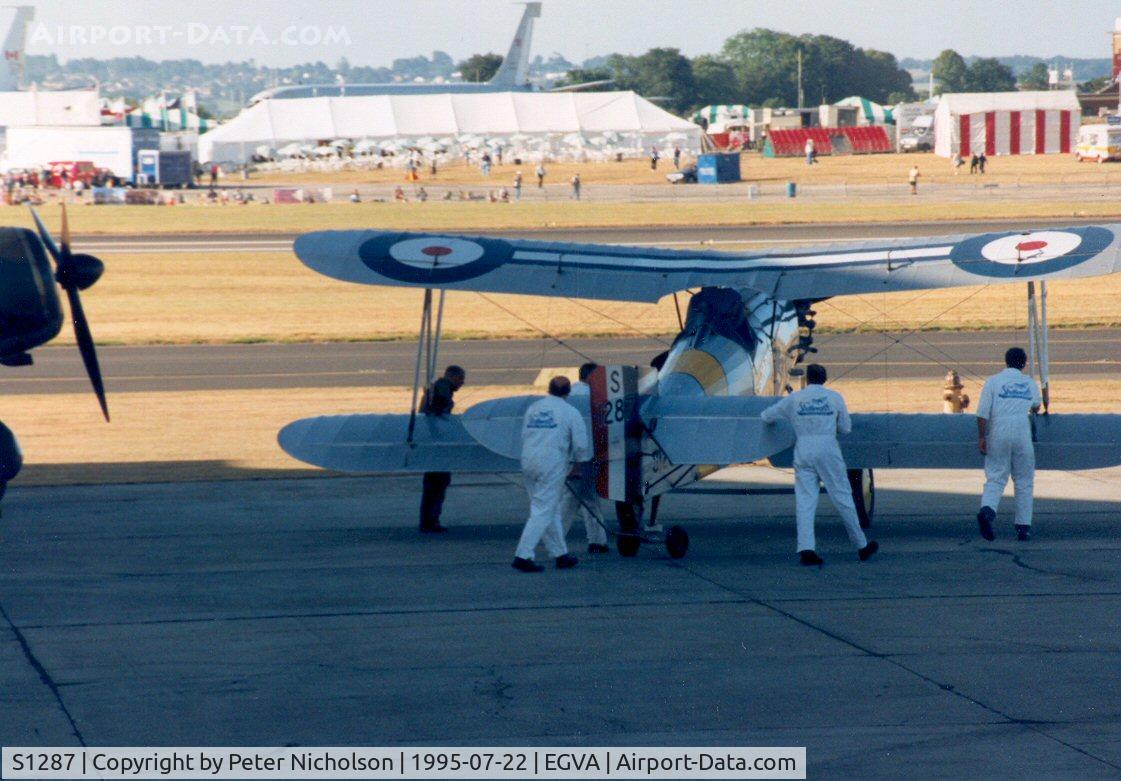 S1287, 1979 Fairey Flycatcher replica C/N WA3, Flycatcher replica, now a museum exhibit at Yeovilton, was airworthy and shown being positioned at the 1995 Intnl Air Tattoo at RAF Fairford.