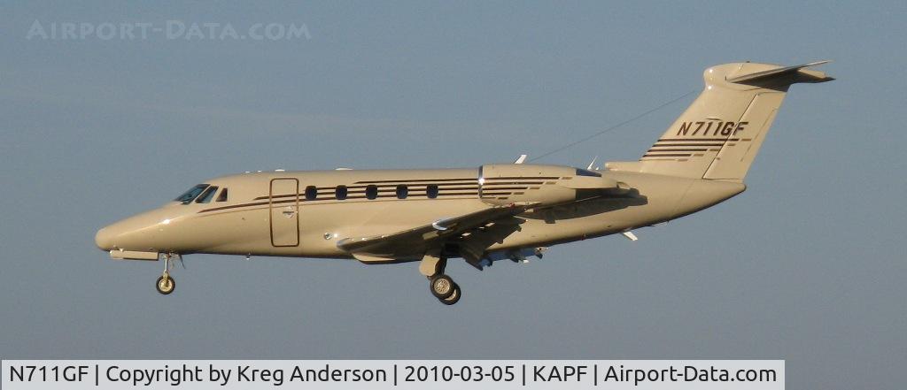 N711GF, 1996 Cessna 650 C/N 650-7075, Arriving on runway 32. Neat paint job!