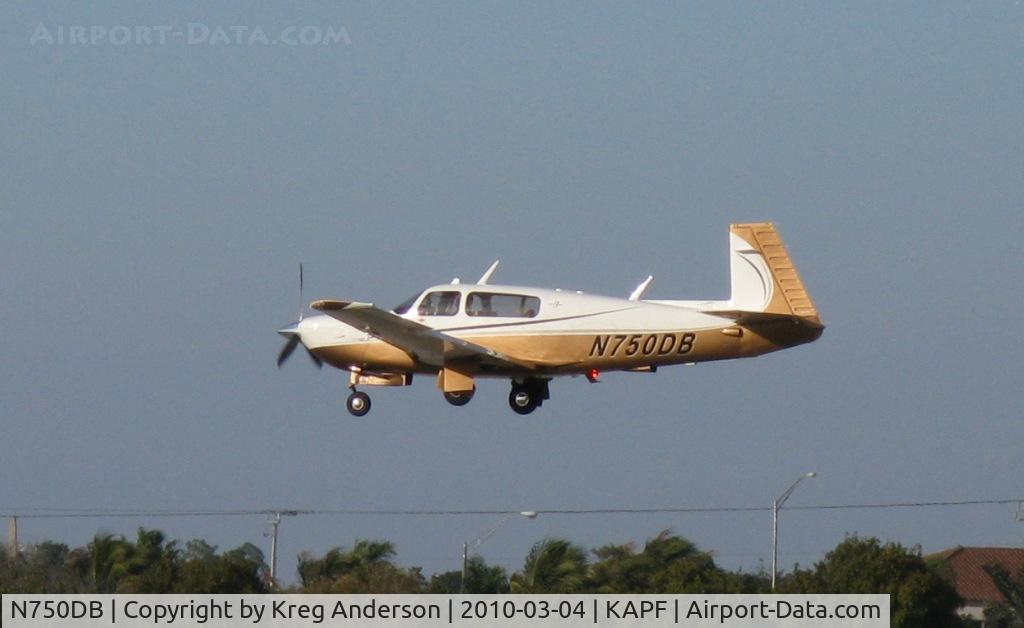 N750DB, 2005 Mooney M20R Ovation C/N 29-0355, Arriving on runway 32