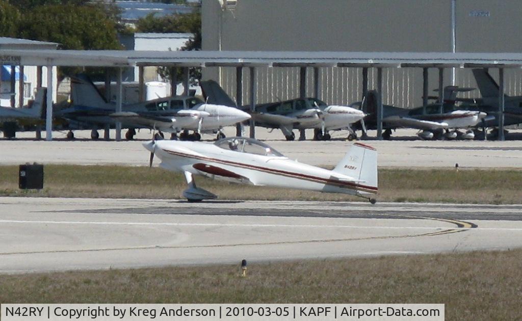 N42RY, 1998 Vans RV-4 C/N 3939, Thank you for identifying this aircraft for me. N42RY is seen departing runway 32.