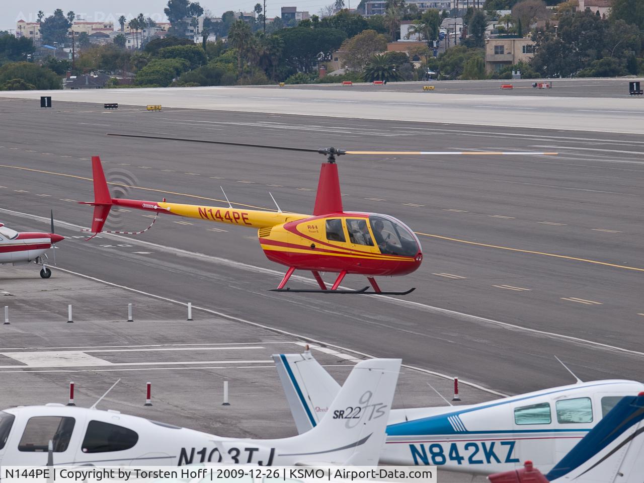 N144PE, 2008 Robinson R44 II C/N 12183, N144PE moving from the helipad to the runway