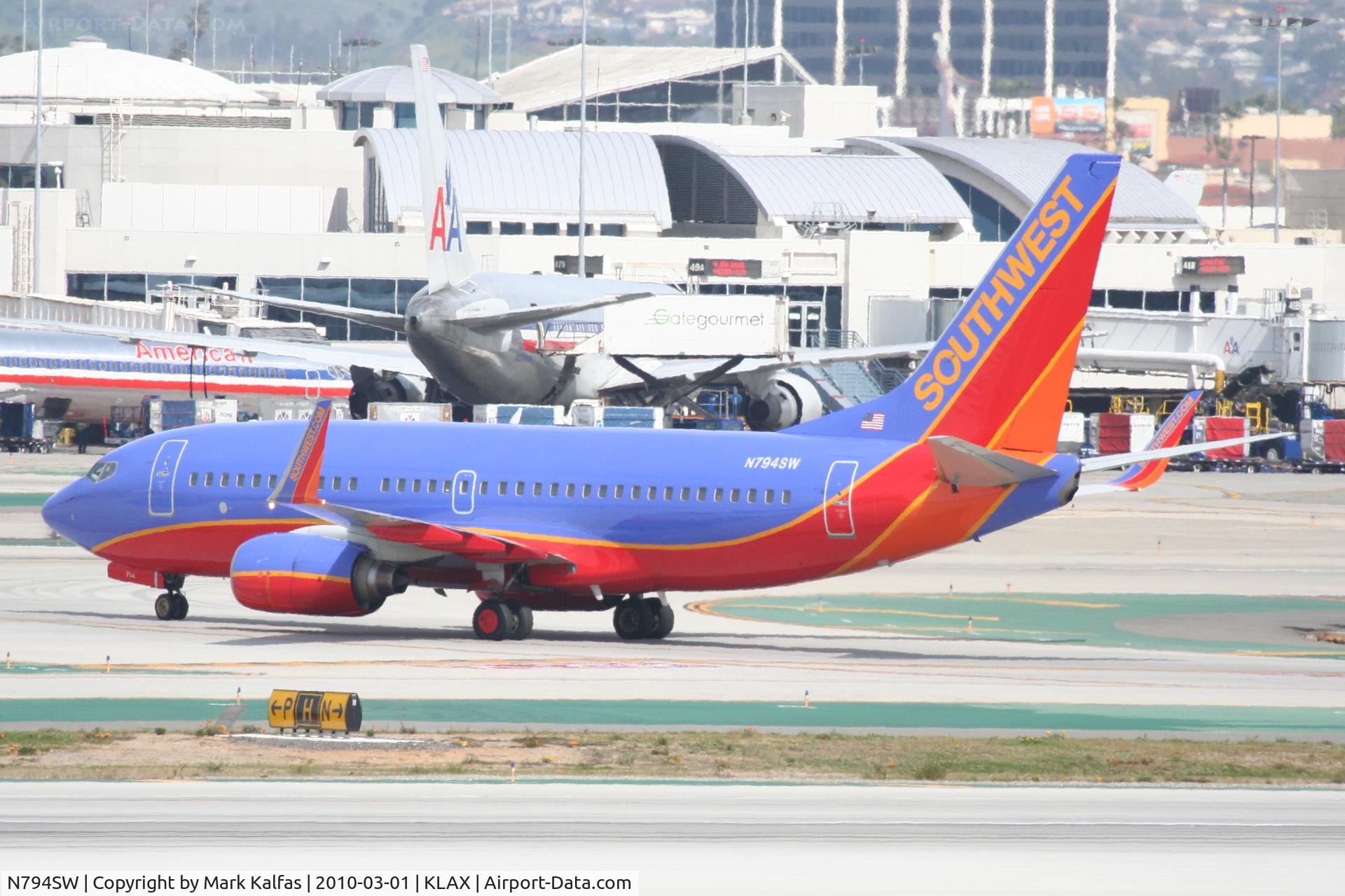 N794SW, 2001 Boeing 737-7H4 C/N 30605, Southwest Airlines Boeing 737-7H4, SWA188 arriving from KLAS, taxiway Papa KLAX.