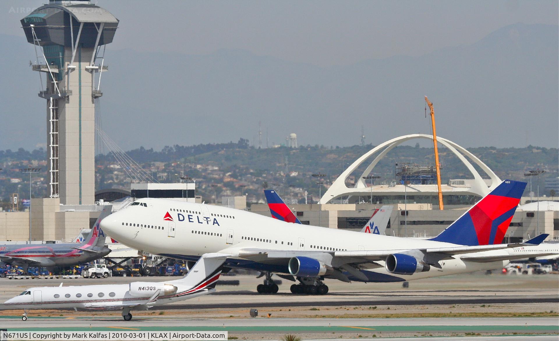 N671US, 1999 Boeing 747-451 C/N 26477, Delta Airlines Boeing 747-451, N671US, DAL283 25R departure en route to RJAA (Narita Int'l).