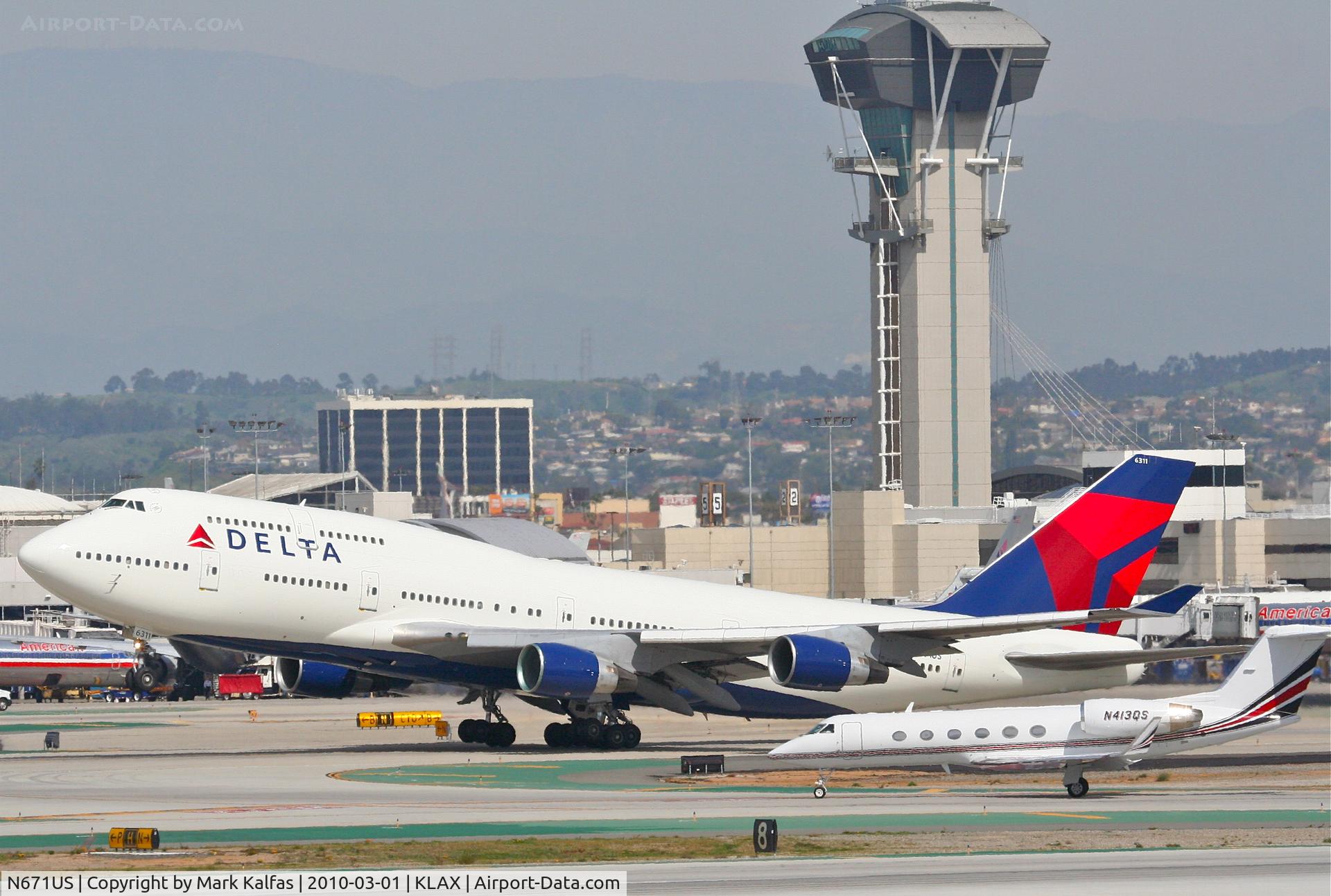 N671US, 1999 Boeing 747-451 C/N 26477, Delta Airlines Boeing 747-451, N671US, DAL283 25R departure en route to RJAA (Narita Int'l).