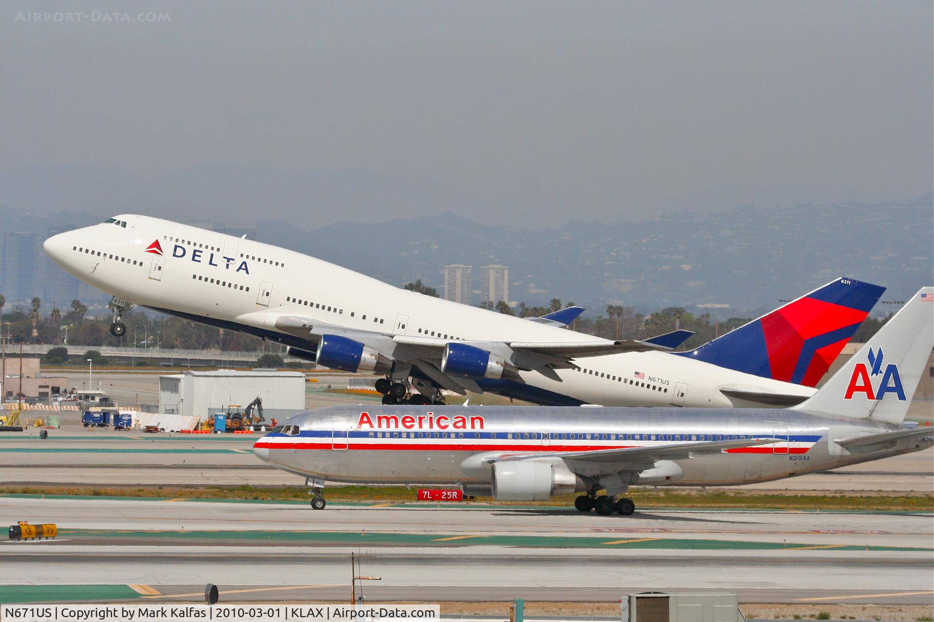 N671US, 1999 Boeing 747-451 C/N 26477, Delta Airlines Boeing 747-451, N671US, DAL283 25R departure en route to RJAA (Narita Int'l).