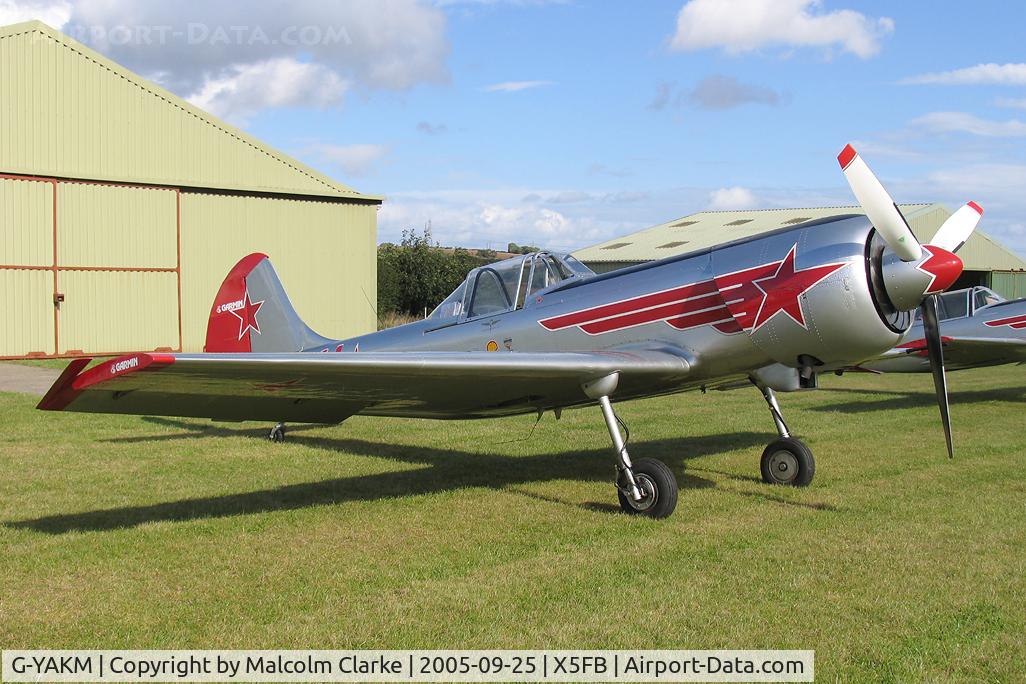 G-YAKM, 1984 Yakovlev Yak-50 C/N 842710, Yakovlev Yak-50 during a refuelling stop prior to performing with the Yakovlevs at the celebration of the 150th anniversary of the Opening of Seaham Docks. 