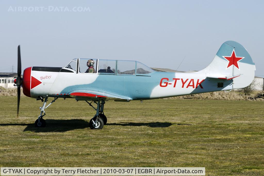 G-TYAK, 1989 Bacau Yak-52 C/N 899907, 1989 Intreprinderea De Avioane Bacau YAK-52 - One of the many aircraft at Breighton on a fine Spring morning