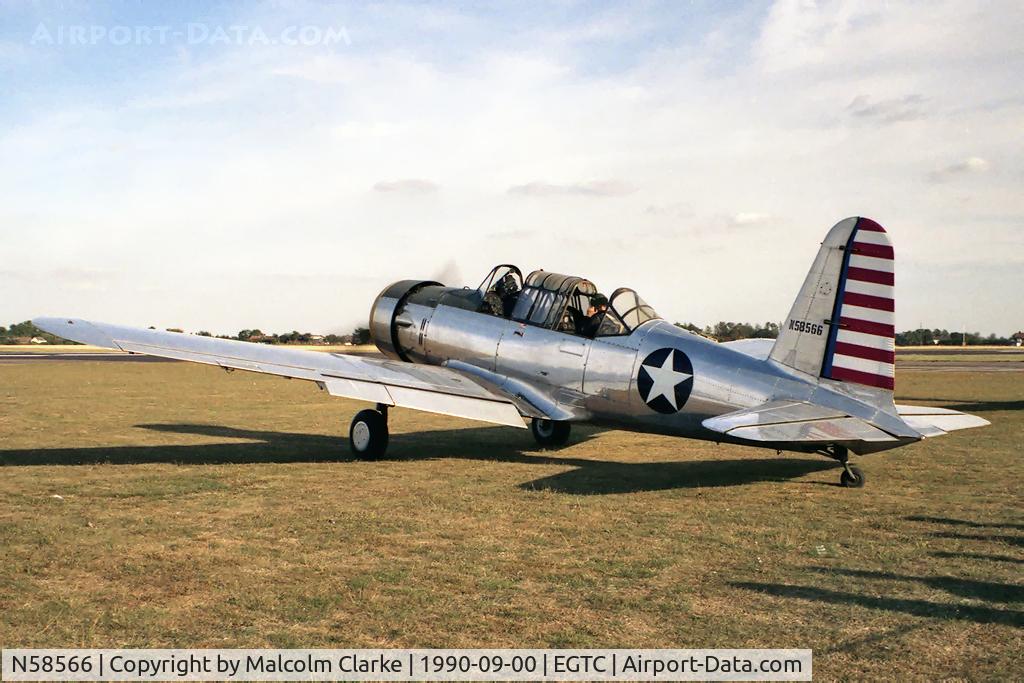 N58566, 1943 Convair BT-15 C/N 10670, Vultee BT-13 Valiant (V-54) at Cranfield Airport in 1990.