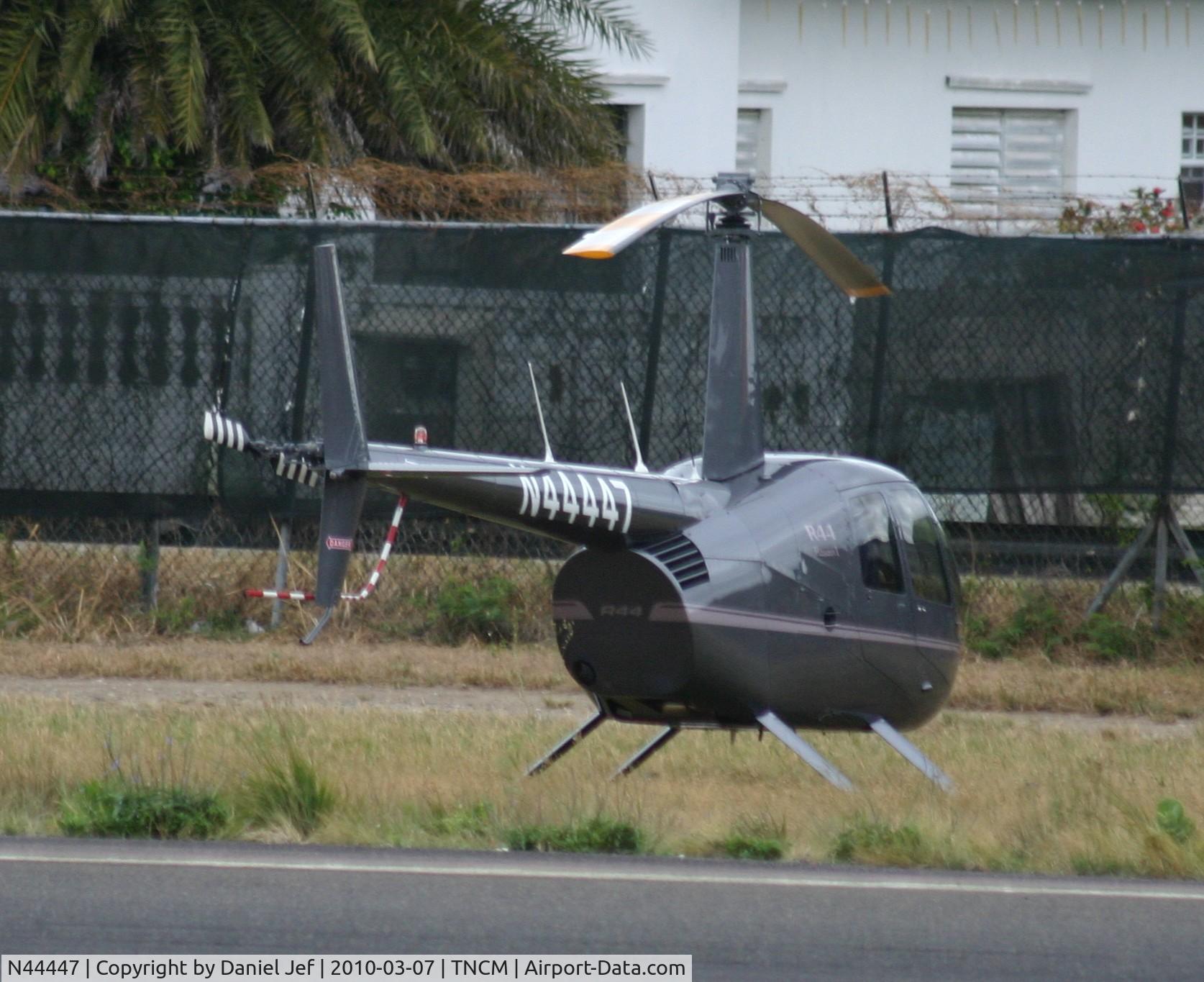 N44447, Robinson R44 C/N 1998, N44447 park at the helipad at TNCM