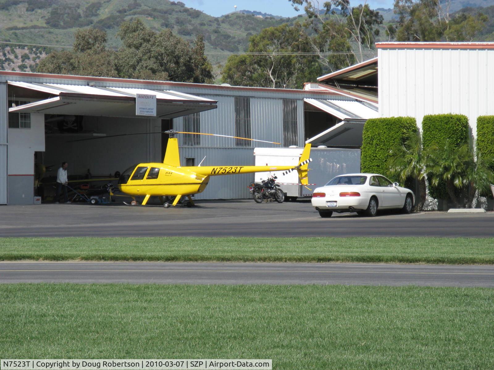 N7523T, 2004 Robinson R44 Raven II C/N 10311, 2004 Robinson R44 II, Lycoming IO-540 derated to 245 Hp for 5 minutes, 205 Hp continuous, tug roll out of hangar