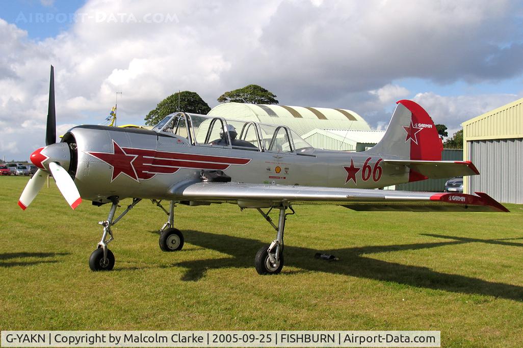 G-YAKN, 1985 Bacau Yak-52 C/N 855905, Bacau Yak-52. In Russian AF colours. Seen here during a refuelling stop prior to performing with the 