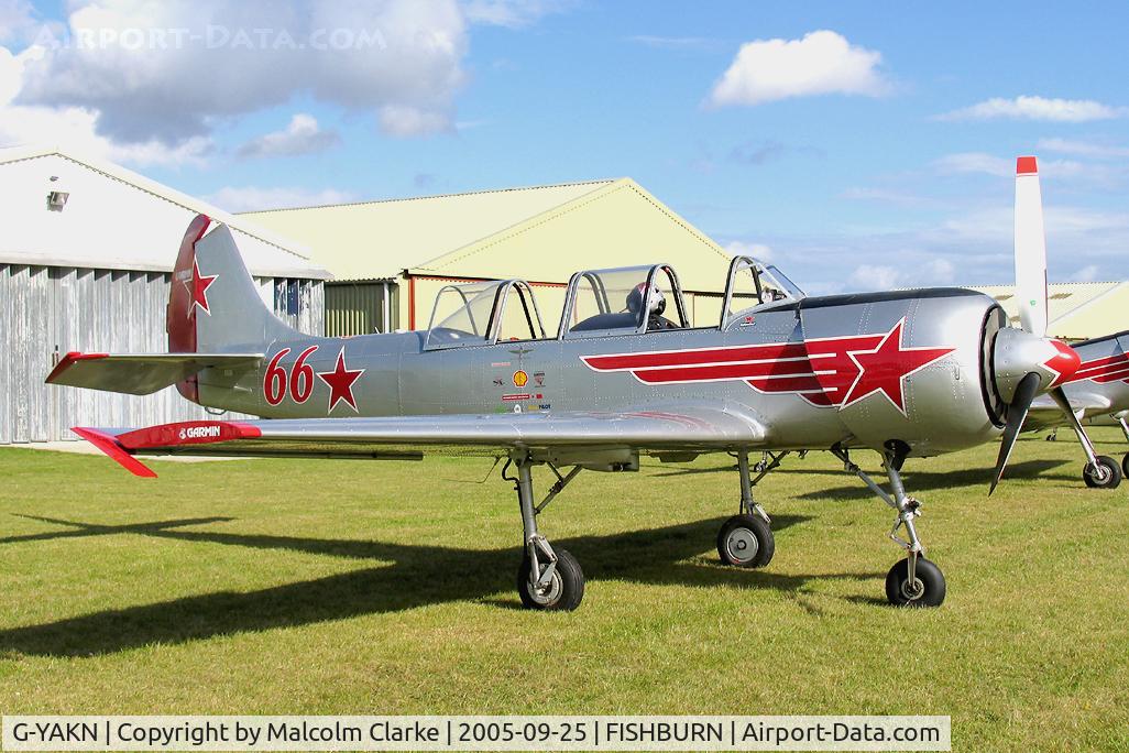 G-YAKN, 1985 Bacau Yak-52 C/N 855905, Bacau Yak-52. In Russian AF colours. Seen here during a refuelling stop prior to performing with the 