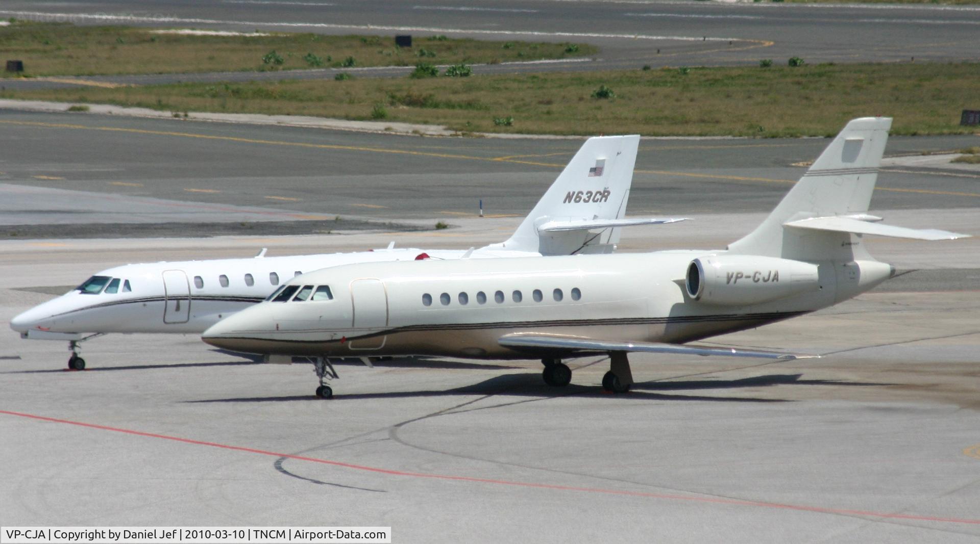 VP-CJA, 1995 Dassault Falcon 2000 C/N 18, VP-CJA park at the main ramp at TNCM