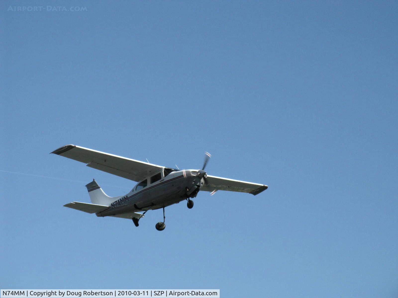 N74MM, 1974 Cessna T210L Turbo Centurion C/N 21060375, 1974 Cessna T210L TURBO CENTURION, Continental TSIO-520-R 310 Hp, takeoff climb Rwy 22, gear in retraction