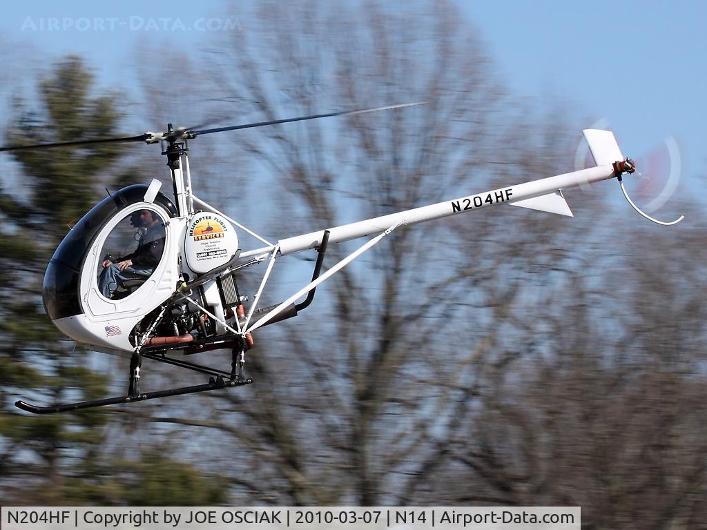 N204HF, 2000 Schweizer 269C-1 C/N 0109, Flying at the Flying W