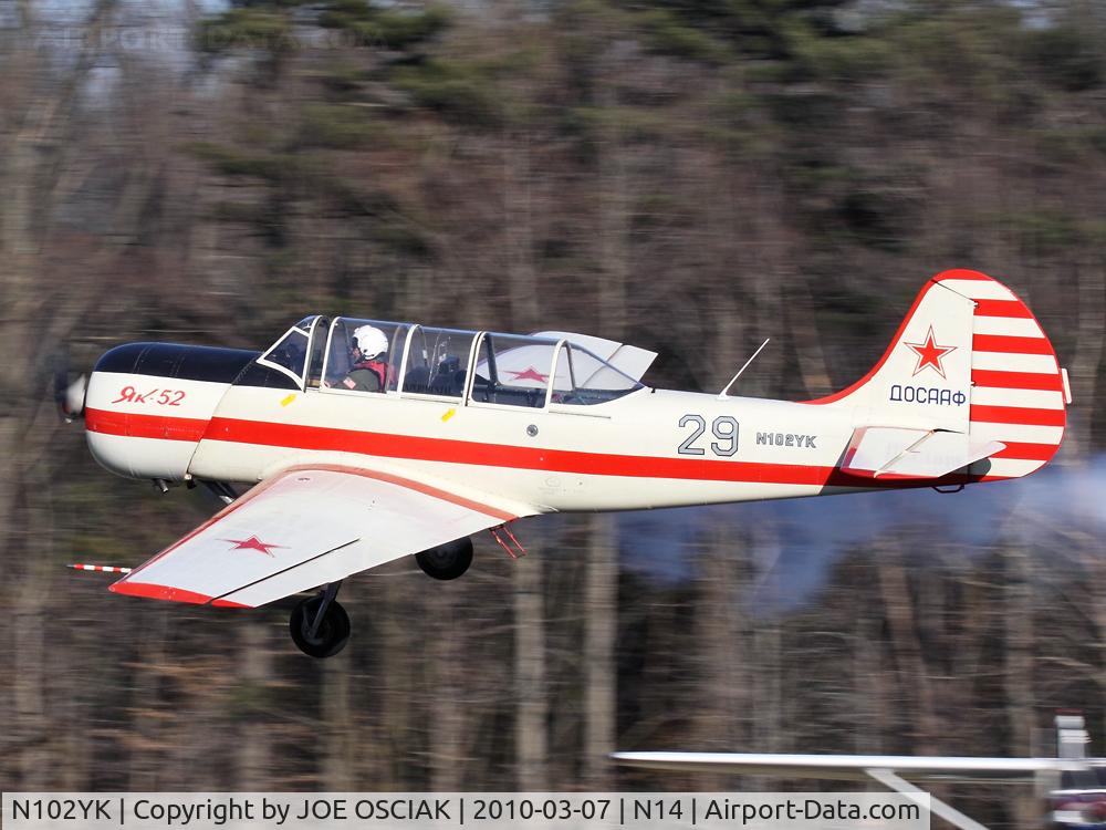 N102YK, 1991 Yakovlev Yak-52 C/N 9111309, Taking off from N14