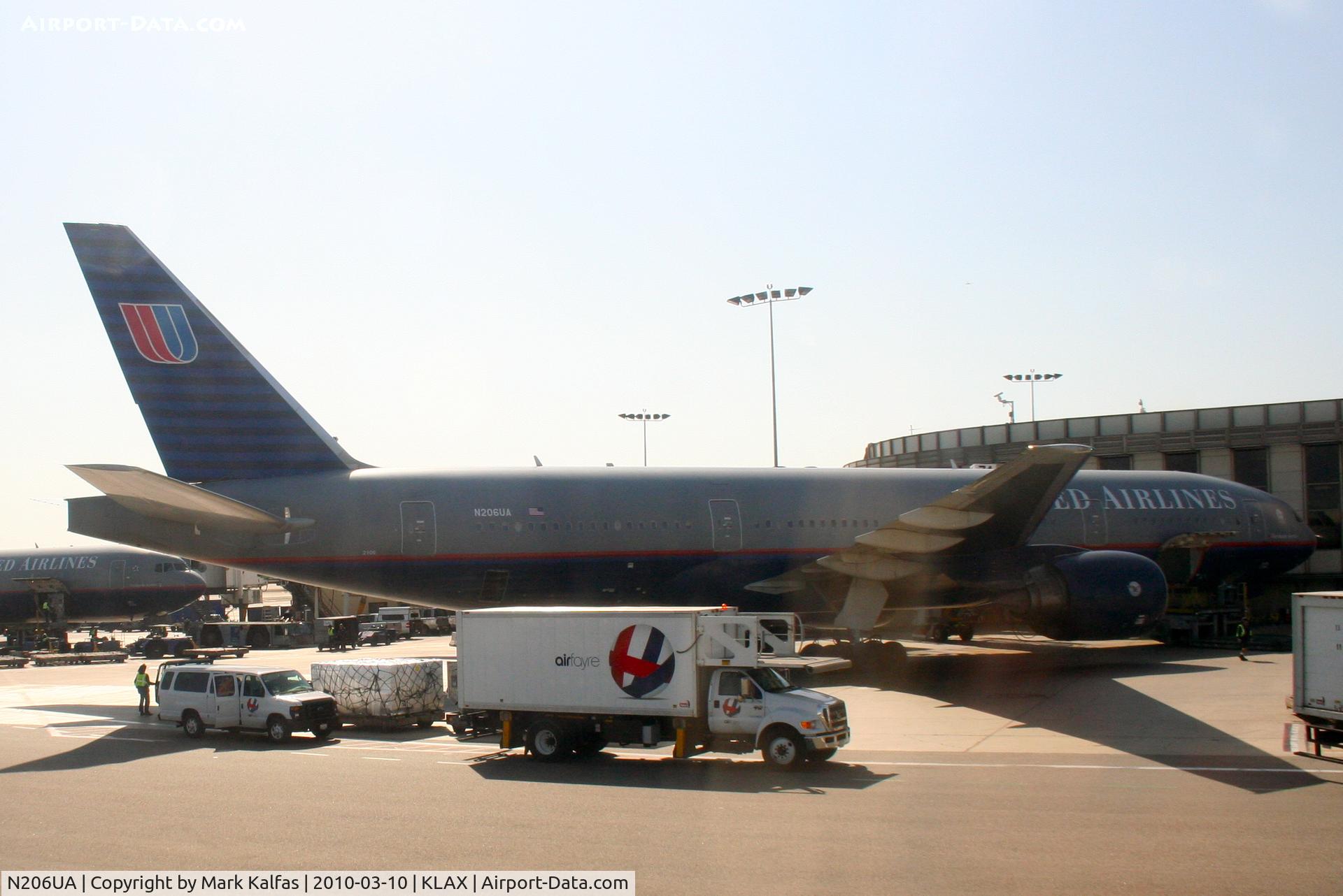 N206UA, 1999 Boeing 777-222/ER C/N 30212, United Airlines Boeing 777-222, N206UA, UAL847T loading up at gat 74 KLAX for a trip to KIAD..
