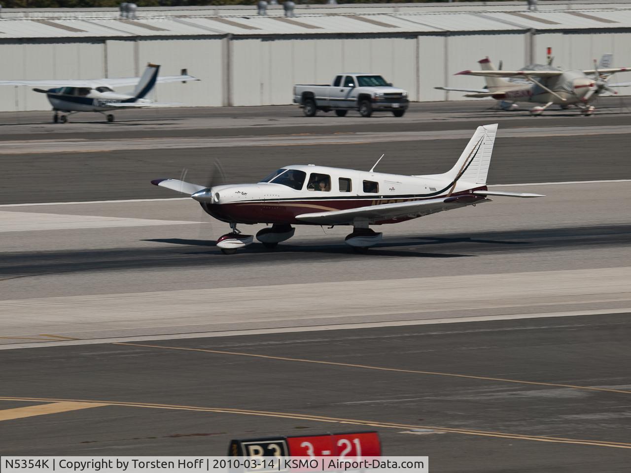 N5354K, 2005 Piper PA-32-301XTC Saratoga C/N 3255033, N5354K departing from RWY 21