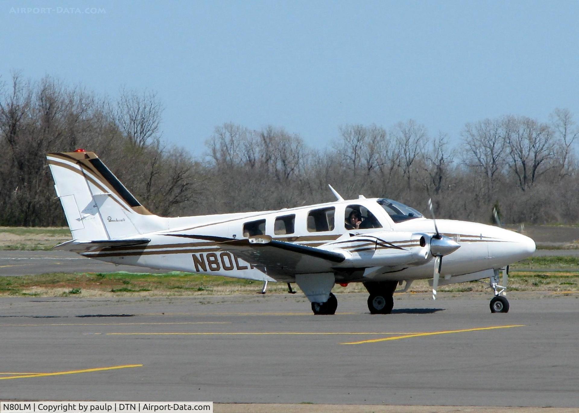 N80LM, 1979 Beech 58P Baron C/N TJ-216, Taxiing in after landing at Downtown Shreveport.