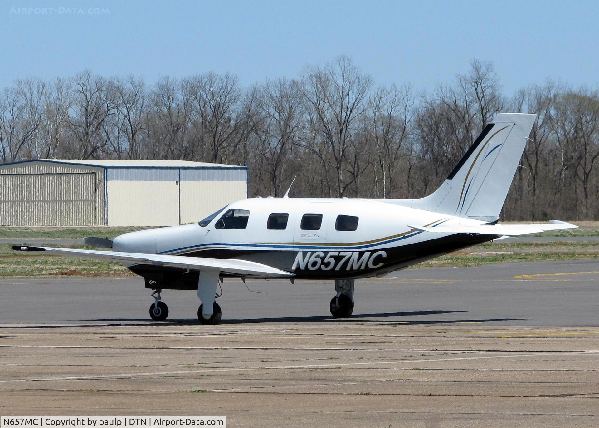 N657MC, 1988 Piper PA-46-350P Malibu Mirage C/N 4622007, Parked at Downtown Shreveport.