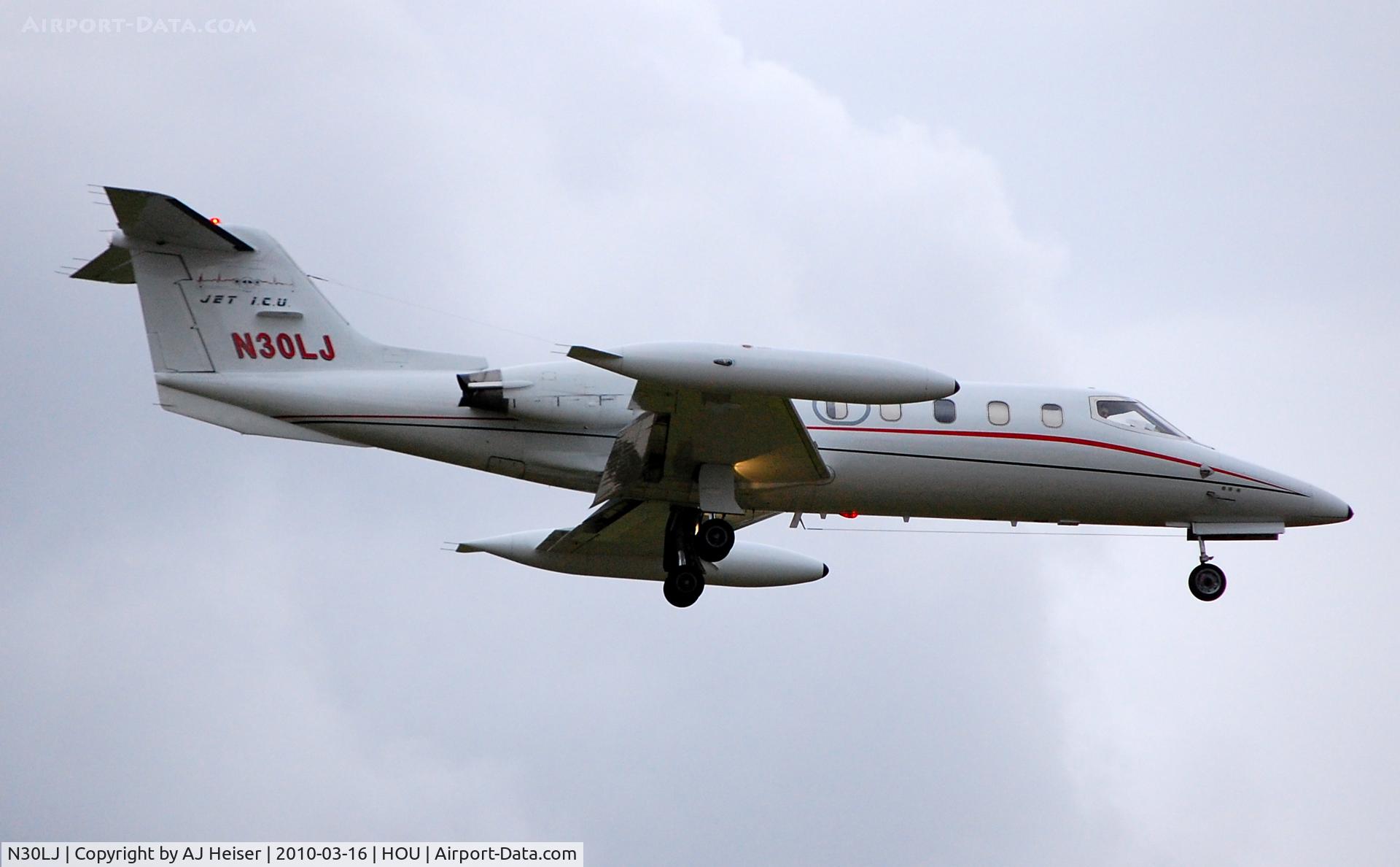 N30LJ, 1976 Gates Learjet 25D C/N 209, Over the numbers rwy 12R