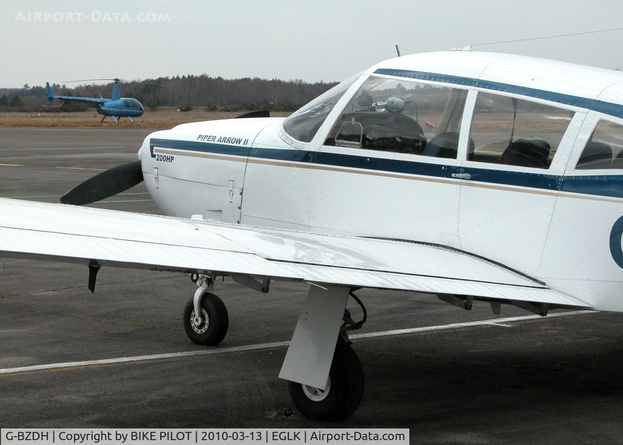G-BZDH, 1972 Piper PA-28R-200 Cherokee Arrow C/N 28R-7235028, VISITING A/C ON THE TERMINAL APRON