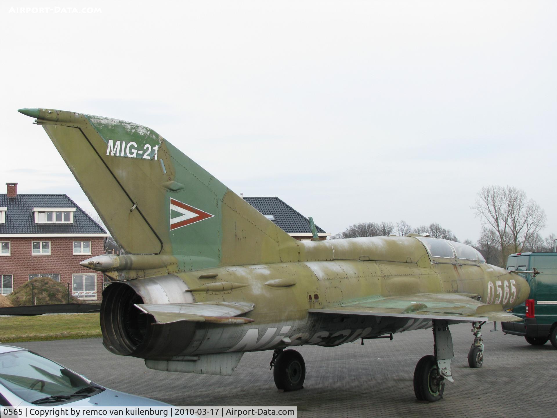 0565, Mikoyan-Gurevich MiG-21UM C/N 05695165, preserved along road N347 by Nissan car dealer Sint Isidorushoeve near Haaksbergen Netherlands