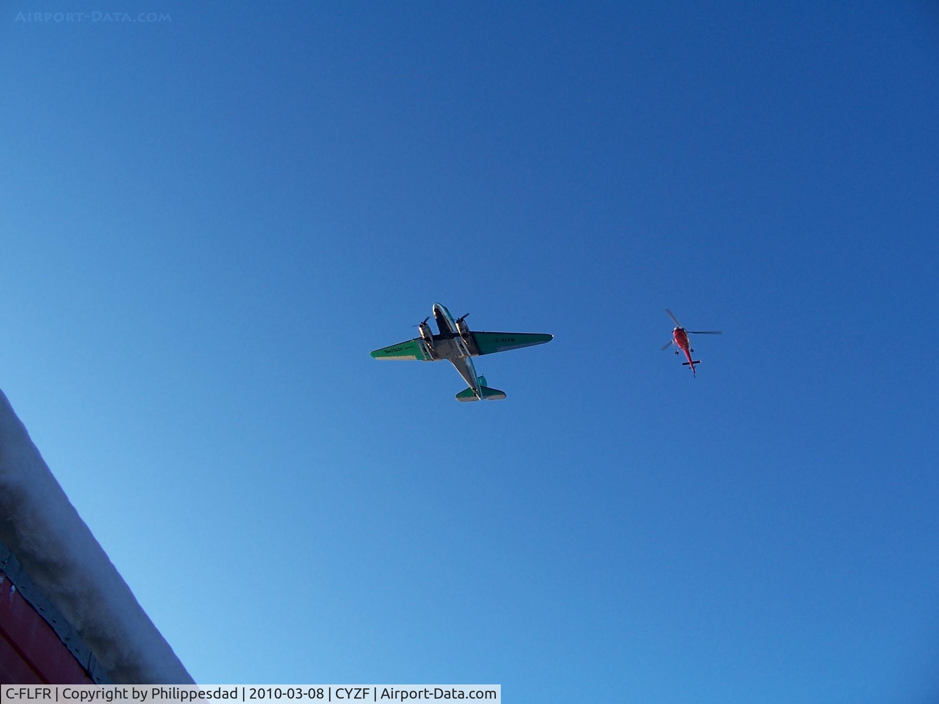 C-FLFR, 1942 Douglas DC3C-S1C3G (C-47A) C/N 13155, Buffalo Airways DC-3 with helicopter (Ice Pilot filming)