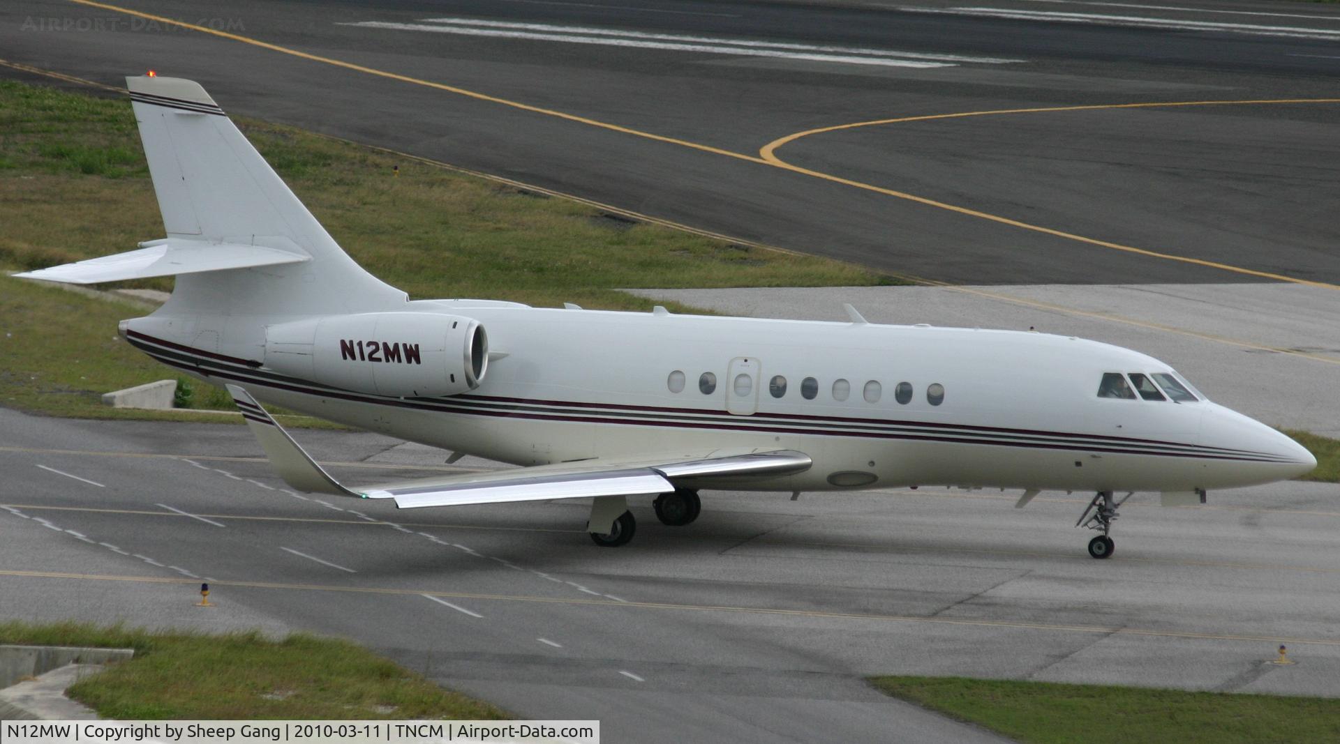 N12MW, 1999 Dassault Falcon 2000 C/N 97, N12MW taxing to the holding point Alpha