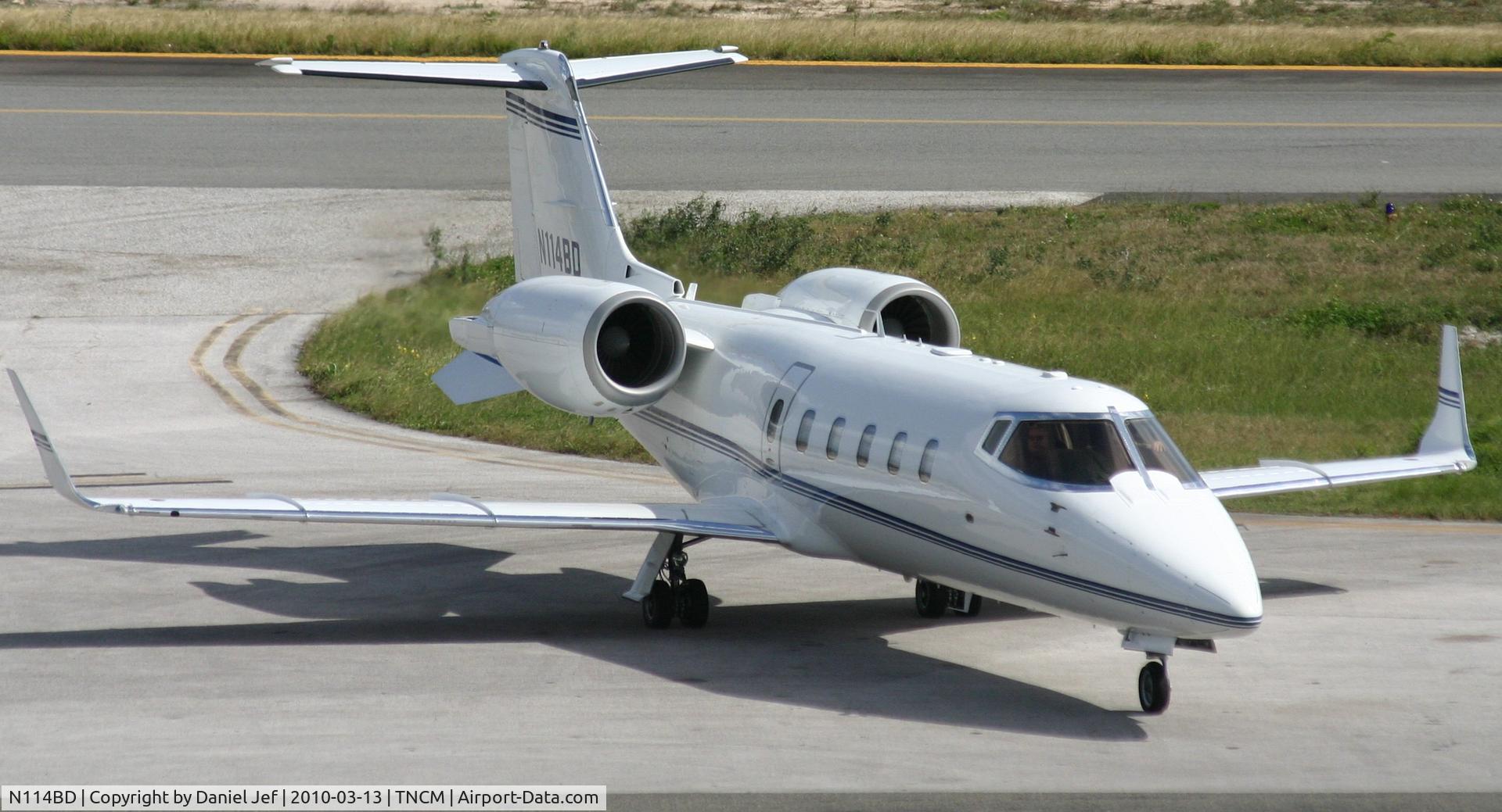 N114BD, 1999 Learjet 60 C/N 60-166, N114BD just about to park at the cargo ramp TNCM