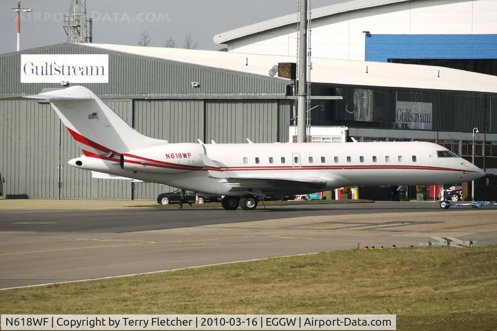 N618WF, 1999 Bombardier BD-700-1A10 Global Express C/N 9005, Global Express being parked at Luton