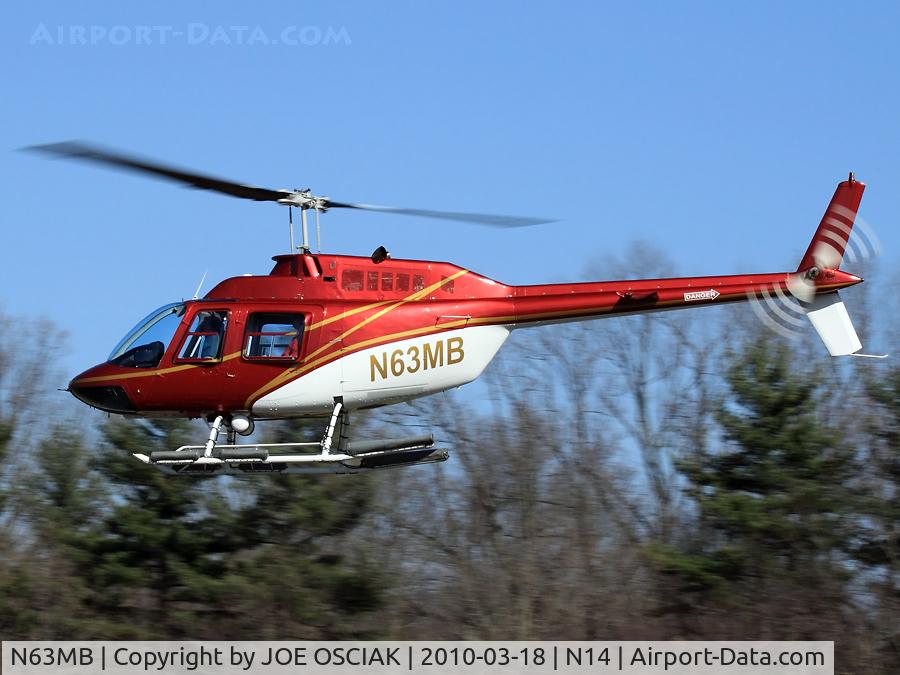 N63MB, 1993 Bell 206B C/N 4261, Leaving the FlyingW