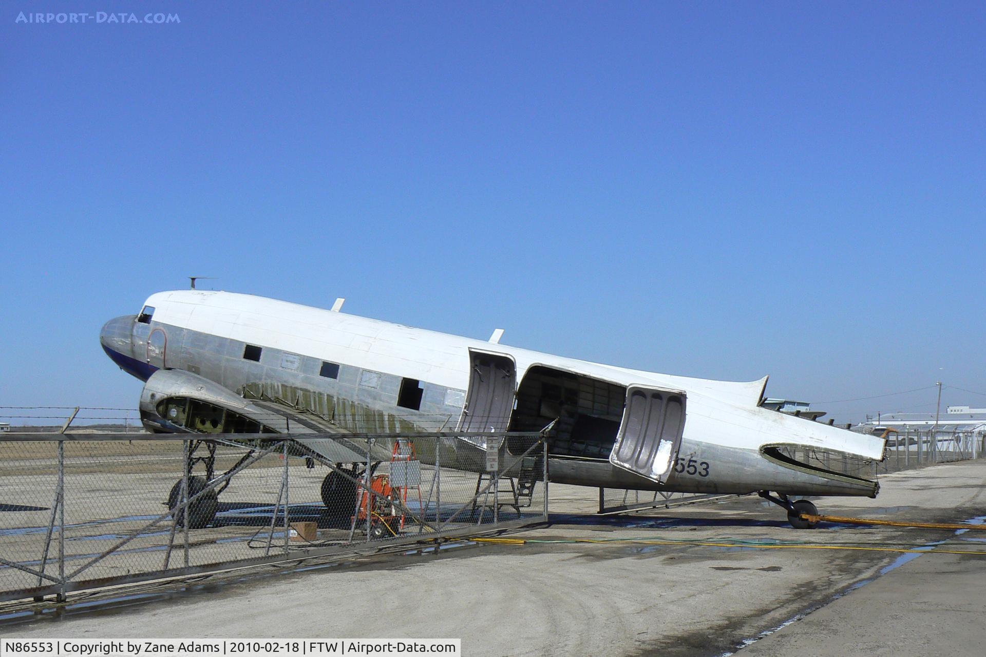 N86553, 1942 Douglas DC-3-G202A C/N 4715, At Fort Worth Meacham Field - Under restoration to WWII C-47 configuration.