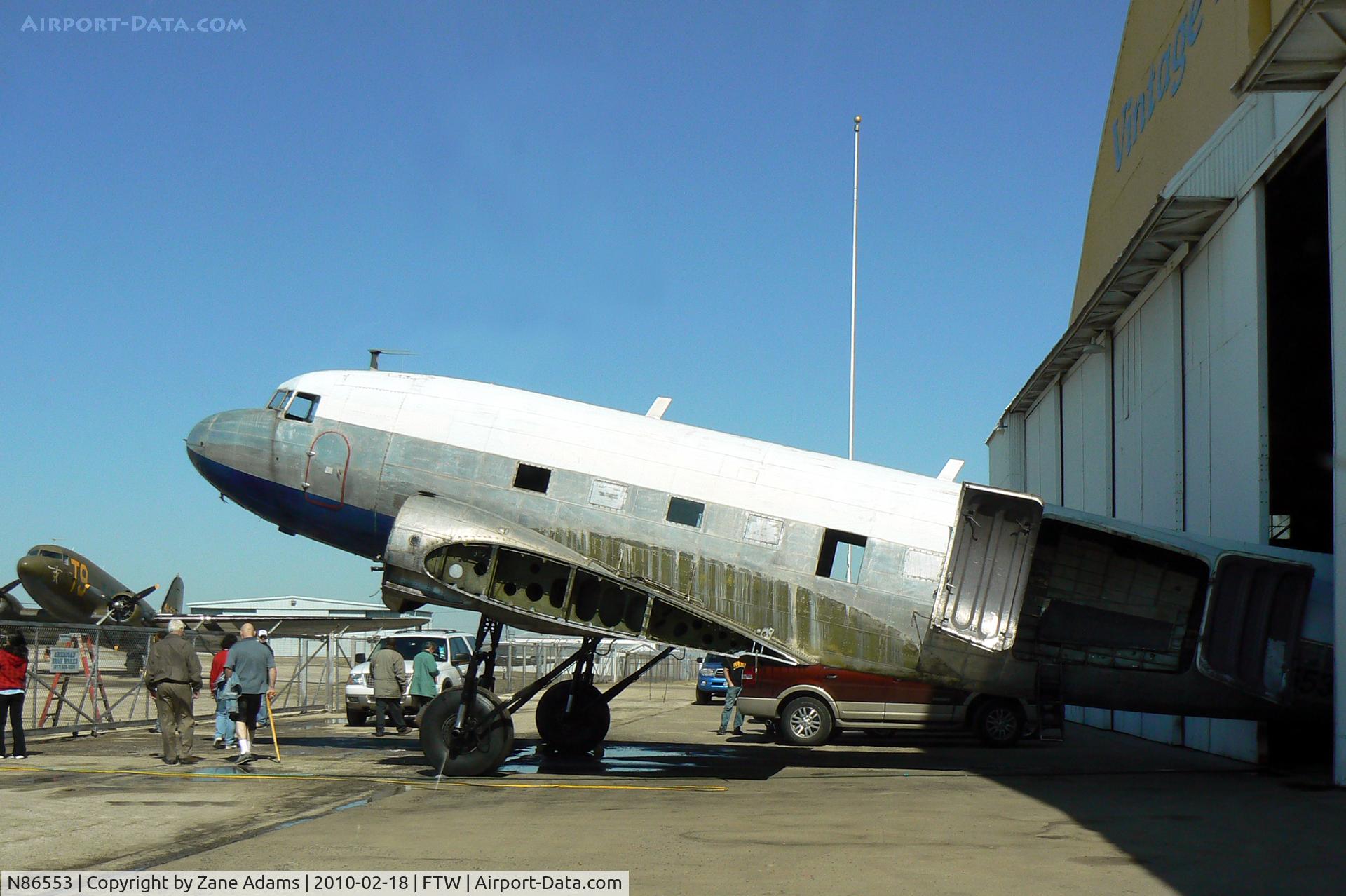 N86553, 1942 Douglas DC-3-G202A C/N 4715, At Fort Worth Meacham Field - Under restoration to WWII C-47 configuration.