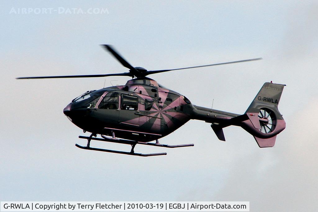 G-RWLA, 2007 Eurocopter EC-135T-2+ C/N 0635, The pink version of the iridescent colour scheme on this EC135T2+ at Gloucestershire (Staverton) Airport