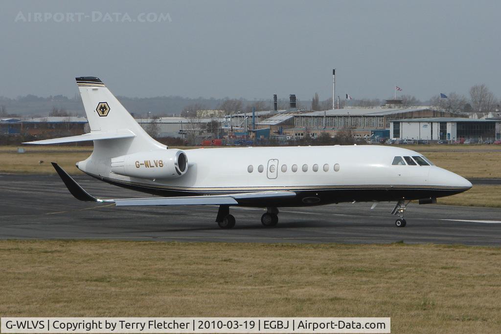 G-WLVS, 2007 Dassault Falcon 2000EX C/N 141, Falcon 2000EX with blended winglets (and Wolverhampton Wanderers FC tail logo) drops racegoers at Gloucestershire (Staverton) Airport