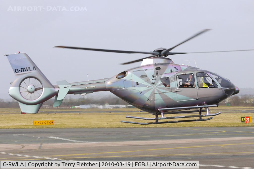 G-RWLA, 2007 Eurocopter EC-135T-2+ C/N 0635, The jade version of the iridescent colour scheme on this EC135T2+ at Gloucestershire (Staverton) Airport