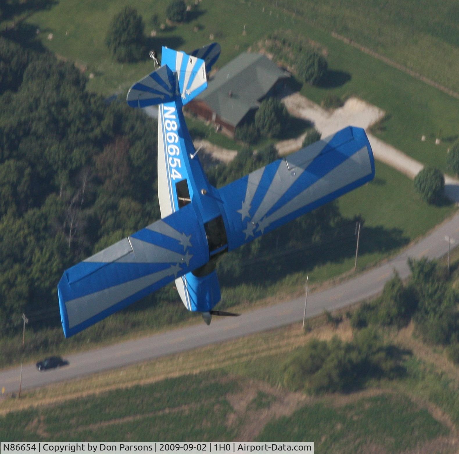 N86654, 1974 Bellanca 7ECA Citabria C/N 1014-74, N86654 recovering from spin