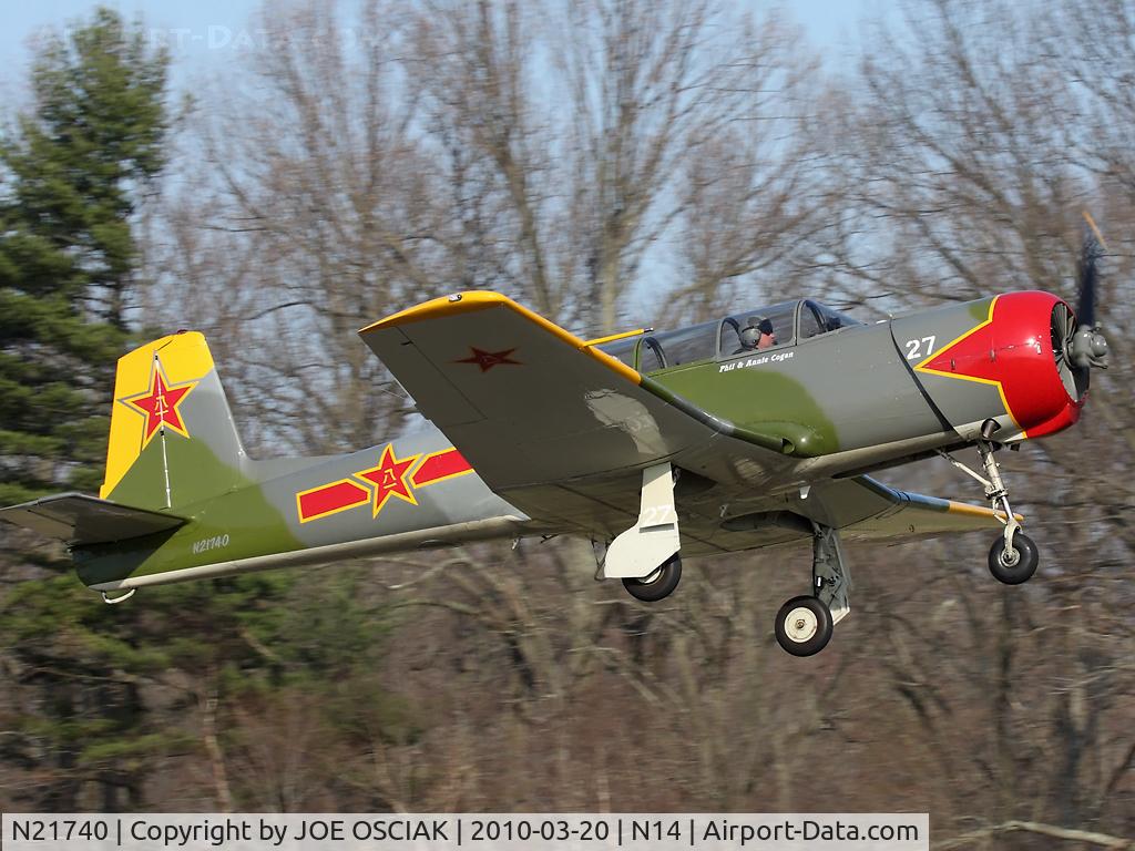 N21740, 1991 Nanchang CJ-6 C/N 3932005, Leaving The Flying W