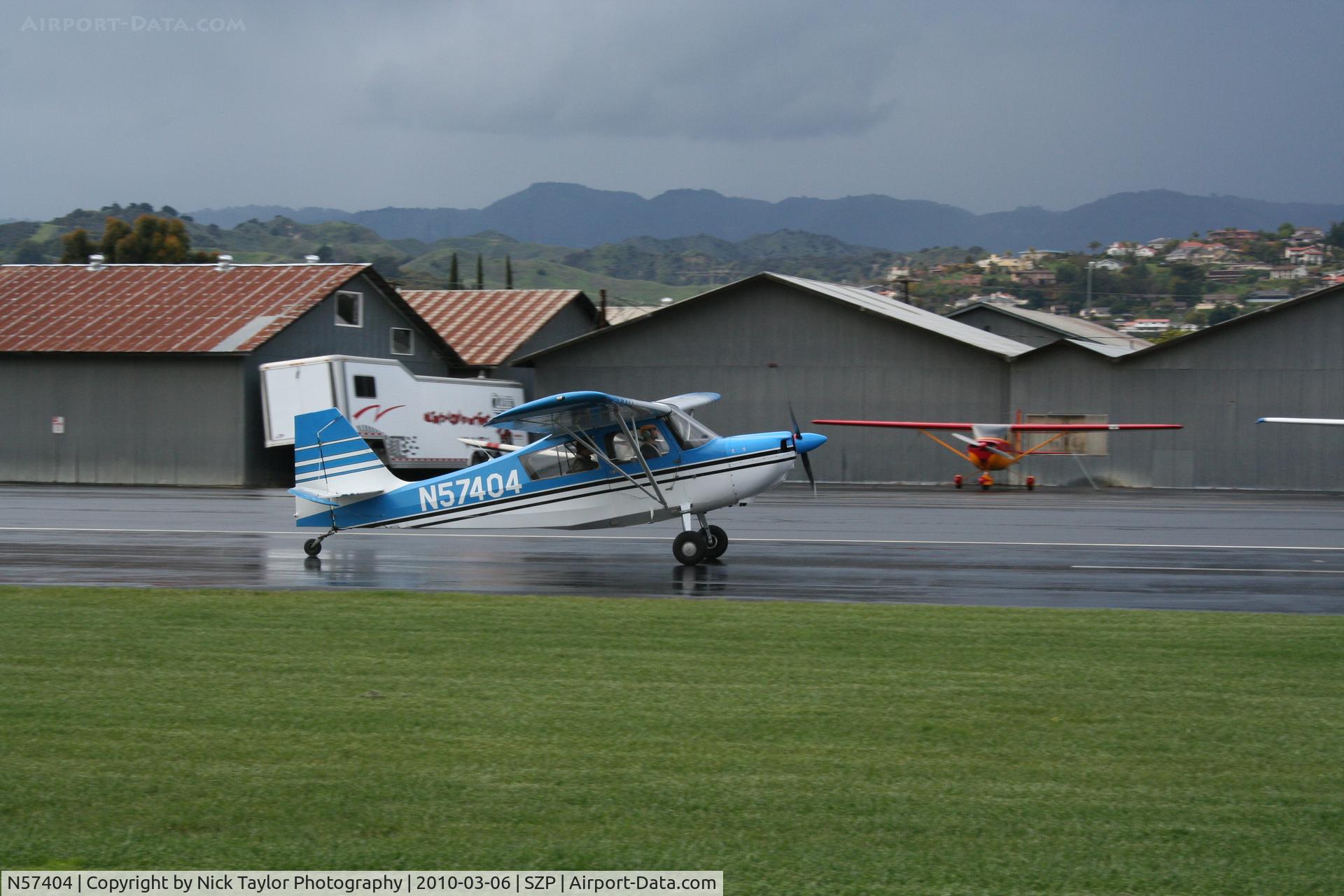 N57404, 1973 Bellanca 7ECA Citabria C/N 940-73, RWY 4 rain soaked takeoff