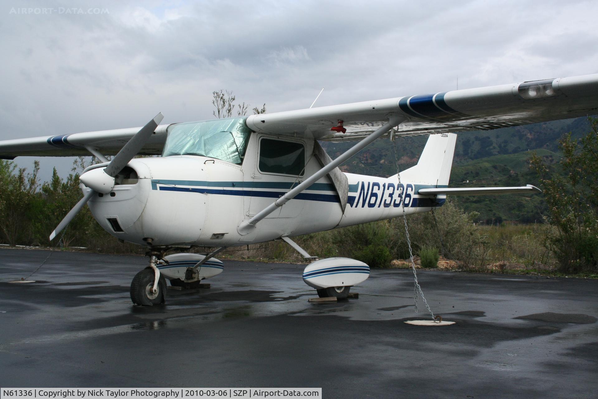 N61336, 1969 Cessna 150J C/N 15070973, Covered in carpet to keep the rain off