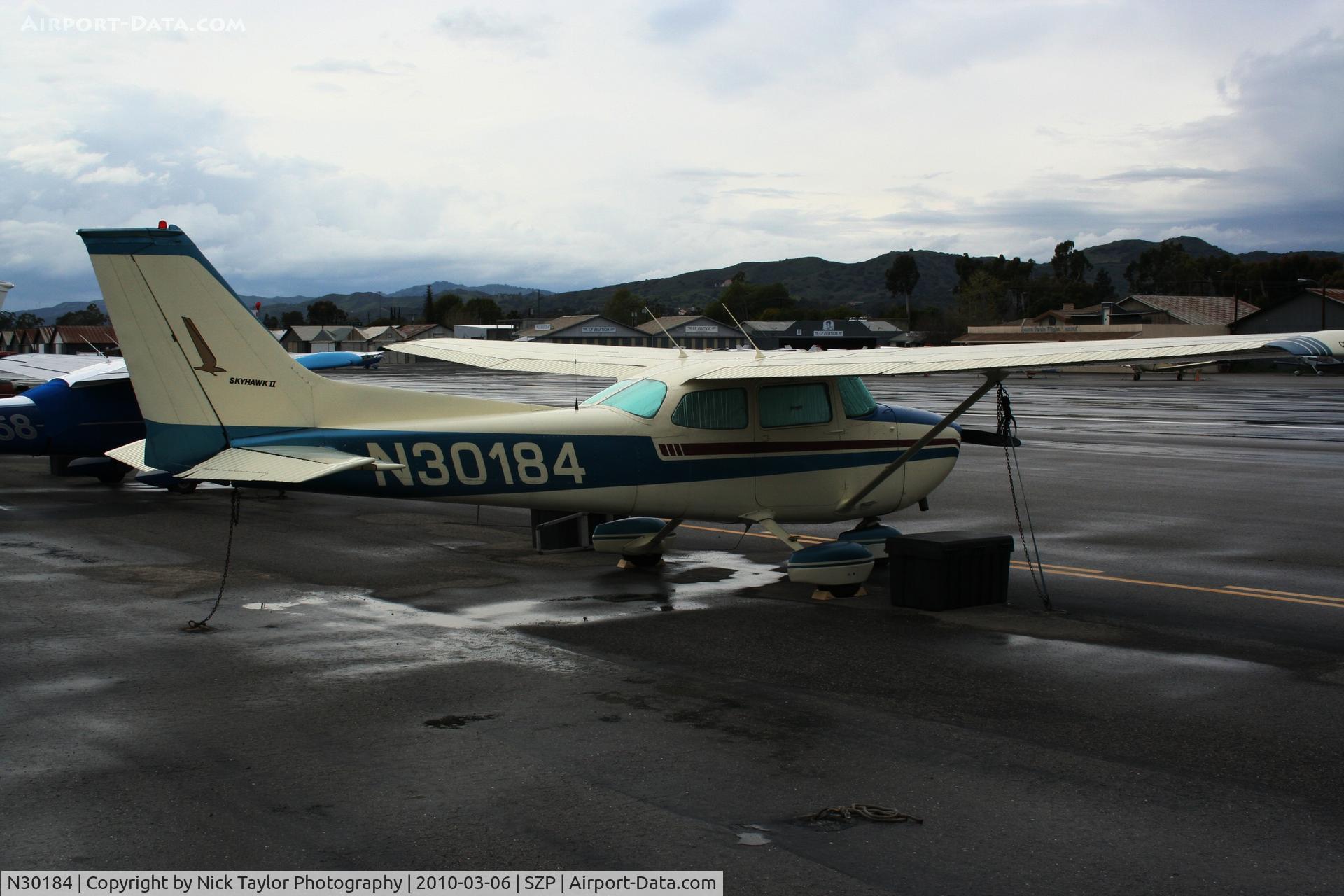 N30184, 1974 Cessna 172M C/N 17264125, Sitting in the rain