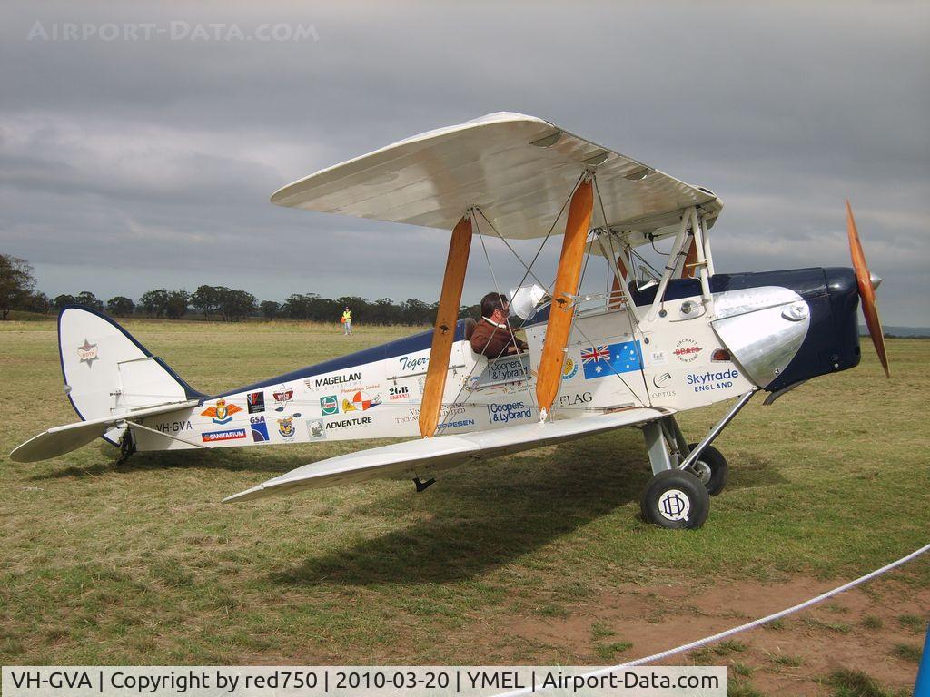 VH-GVA, 1942 De Havilland Australia DH-82A Tiger Moth C/N DHA1014, Heavily sponsored Tiger Moth. Taken at Melton, Victoria, airfield, at the airshow commemorating the 100th anniversary of the first controlled powered flight in Australia on 18 March 1910 by Harry Houdini