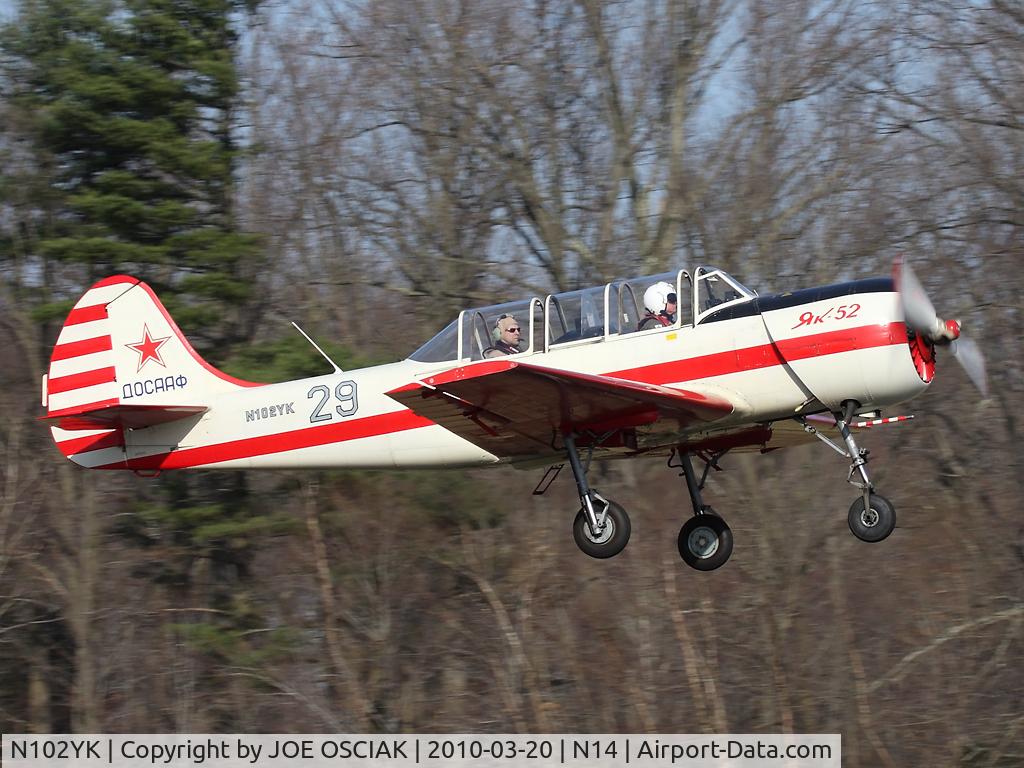 N102YK, 1991 Yakovlev Yak-52 C/N 9111309, Leaving N14