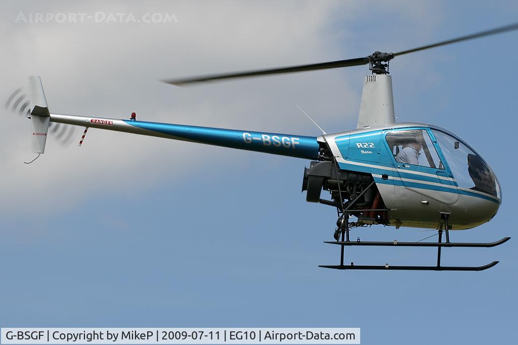 G-BSGF, 1990 Robinson R22 Beta C/N 1383, Flying down the Runway.