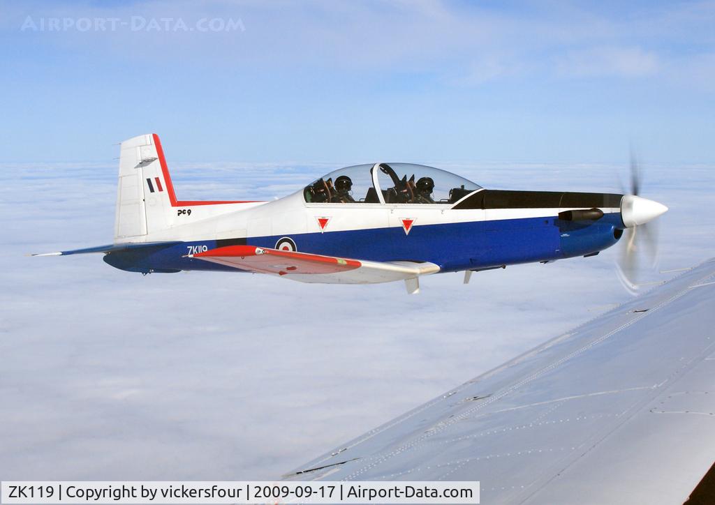 ZK119, Pilatus PC-9 C/N 111, BAE Warton PC-9 (c/n 111). Over the Irish Sea. Wearing basic RSAF scheme, formerly 2204 with the RSAF.