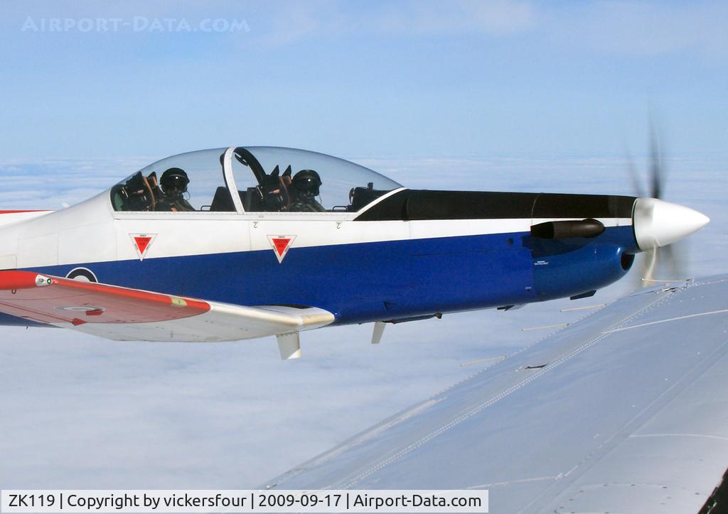 ZK119, Pilatus PC-9 C/N 111, BAE Warton PC-9 (c/n 111). Over the Irish Sea. Wearing basic RSAF scheme, formerly 2204 with the RSAF.